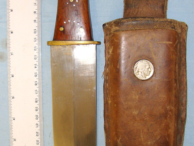 Large Original American Frontier Victorian Era, Hand Forged English Sheffield Made Fighting / Hunting Bowie Knife With Broad Leaf Shaped Spear Point Bowie Blade & Original leather Scabbard Later C1903 Inlaid With Apache Native Indian Head ‘Liberty’ Di Hunting Knive