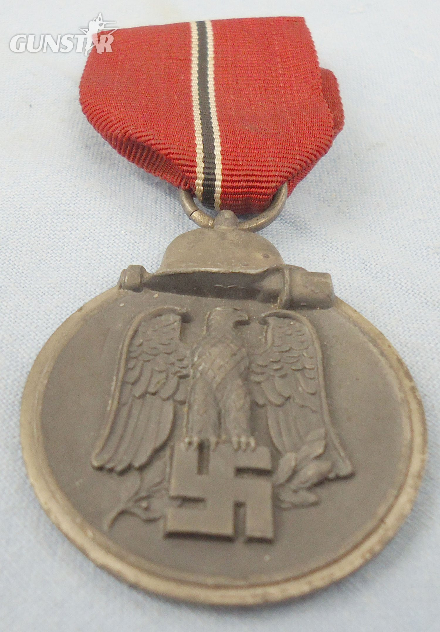 Nazi Eastern Medal ‘Winter Battle in the East’ 1941–42 Medal and Ribbon. M 138. Nazi Eastern Medal ‘Winter Battle in the East’ 1941–42 Medal and Ribbon. M 138.  Antique & Militaria