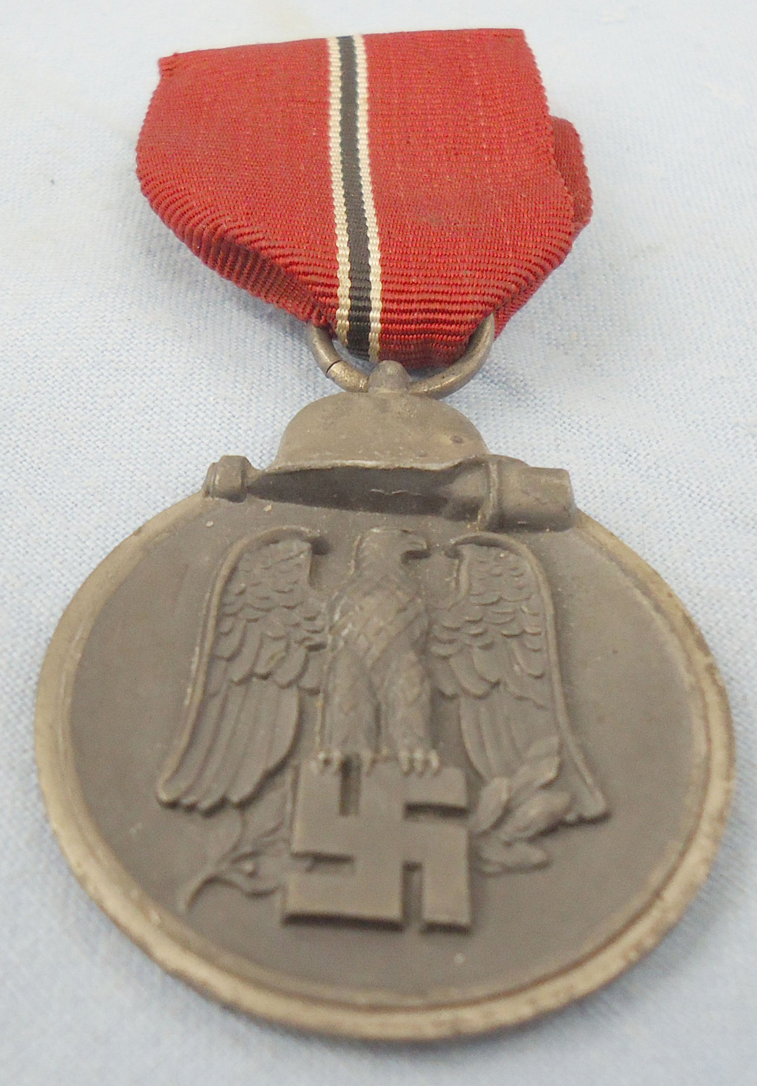 Nazi Eastern Medal ‘Winter Battle in the East’ 1941–42 Medal and Ribbon. M 138. Nazi Eastern Medal ‘Winter Battle in the East’ 1941–42 Medal and Ribbon. M 138.  Antique & Militaria