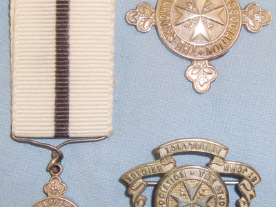 A Silver St. John Ambulance Ass. Medal, St. John Ambulance Brigade Badge & Order of St. John Priory Of Wales Miniature L.S. Medal & Ribbon. Sn 10391:3. A Silver St. John Ambulance Ass. Medal, St. John Ambulance Brigade Badge & Order of St. John Priory Of Wales Miniature L.S. Medal & Ribbon. Sn 10391:3. Other Accessory