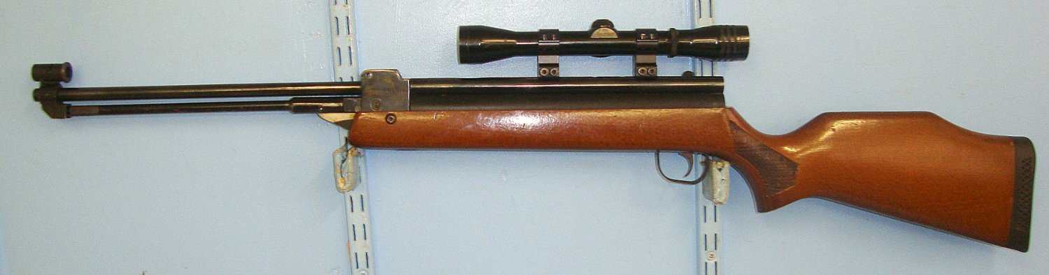  1980’s British Sterling Armaments Company HR 81 .22 Calibre Bolt Action Loading Underlever Air Rifle With Redfield 4X Telescopic Sight. Sn 23500 air rifle .22