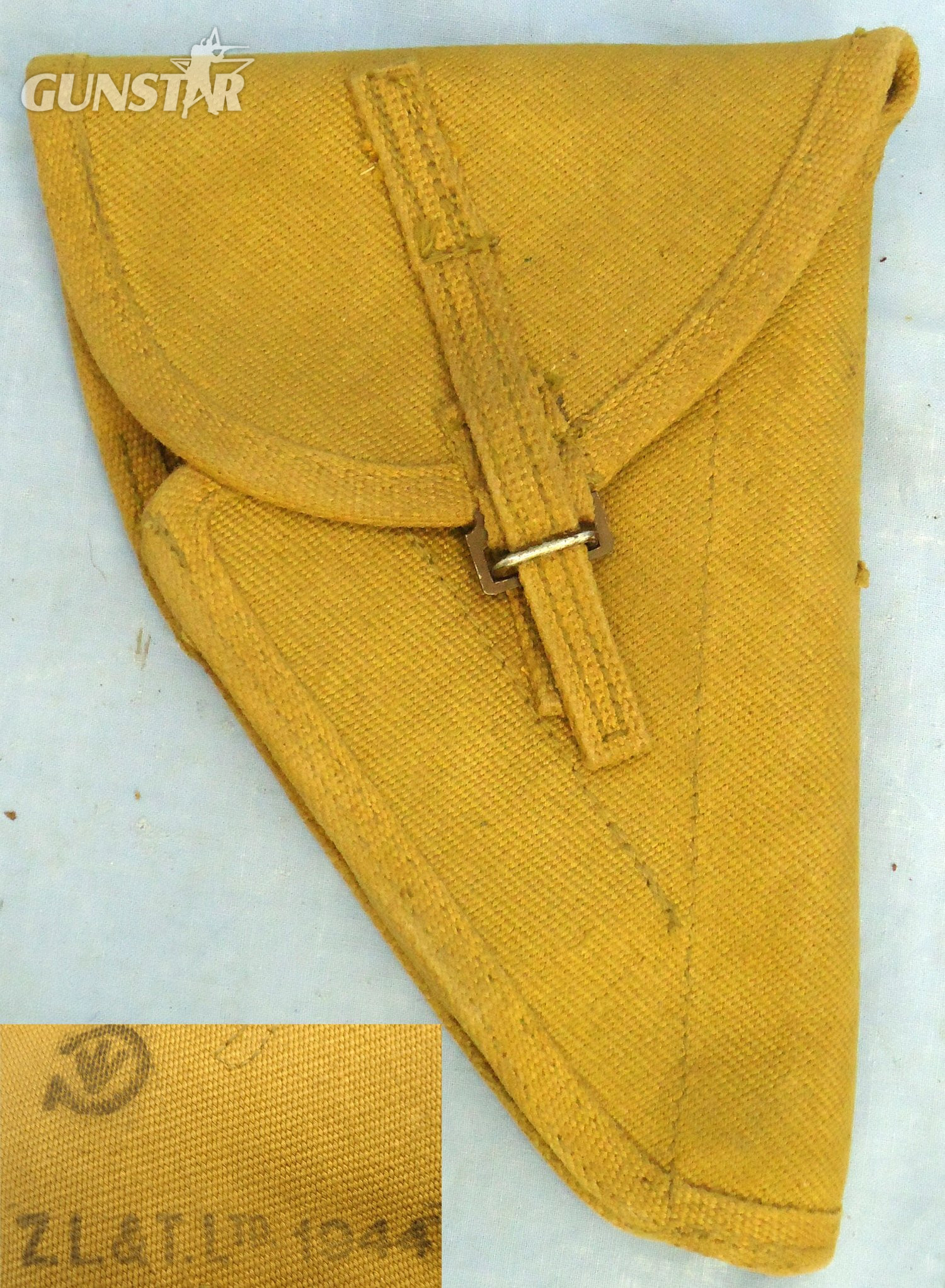 Canadian, 1944 Dated, Pattern 37 Webbing Holster for the 9mm Hi Power Semi Automatic Service Pistol. MISC 2009  Canadian, 1944 Dated, Pattern 37 Webbing Holster for the 9mm Hi Power Semi Automatic Service Pistol. MISC 2009 Care & Storage in 