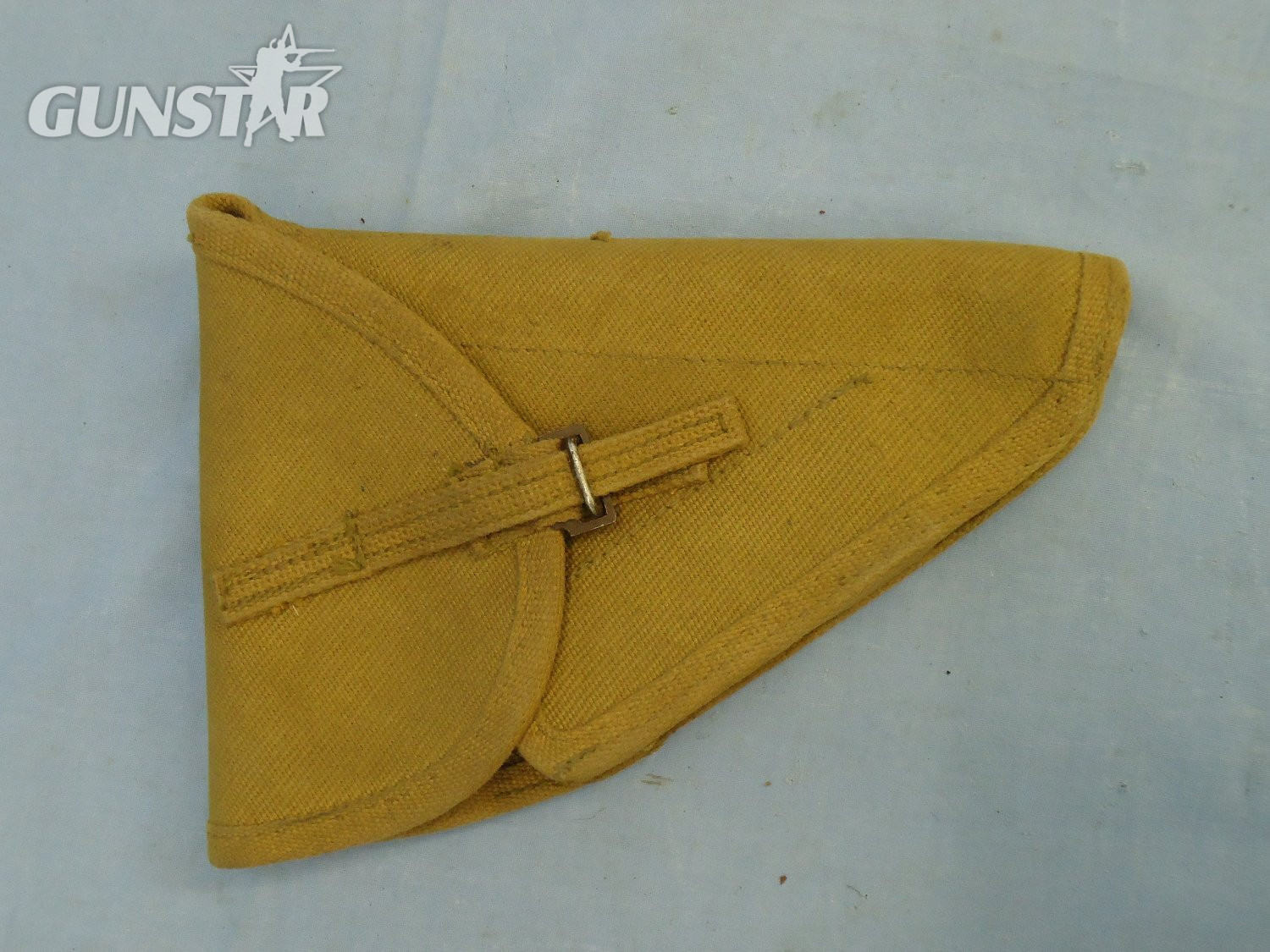 Canadian, 1944 Dated, Pattern 37 Webbing Holster for the 9mm Hi Power Semi Automatic Service Pistol. MISC 2009  Canadian, 1944 Dated, Pattern 37 Webbing Holster for the 9mm Hi Power Semi Automatic Service Pistol. MISC 2009 Care & Storage - {CATEGORY}