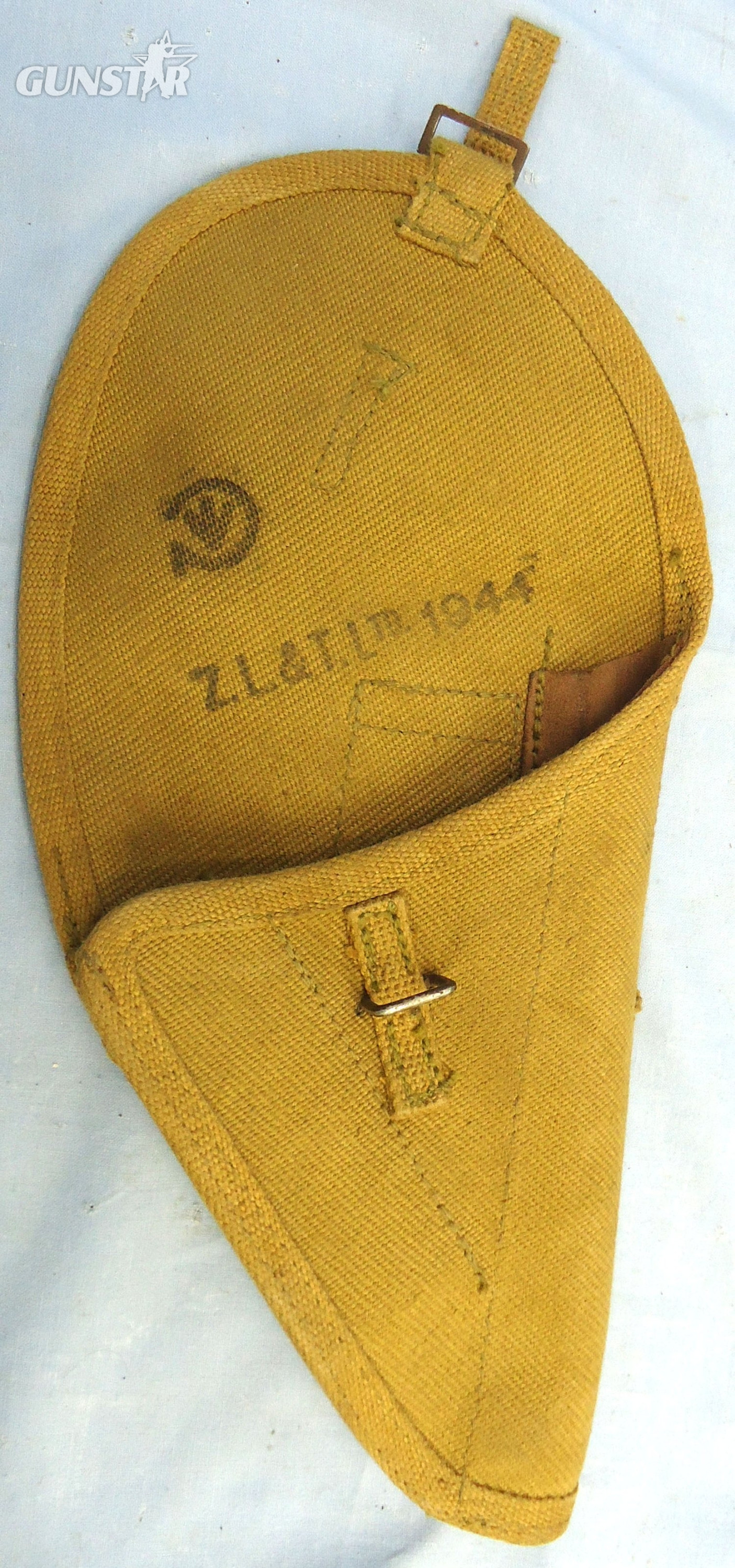 {CATEGORY} - Canadian, 1944 Dated, Pattern 37 Webbing Holster for the 9mm Hi Power Semi Automatic Service Pistol. MISC 2009  Canadian, 1944 Dated, Pattern 37 Webbing Holster for the 9mm Hi Power Semi Automatic Service Pistol. MISC 2009 Care & Storage in 