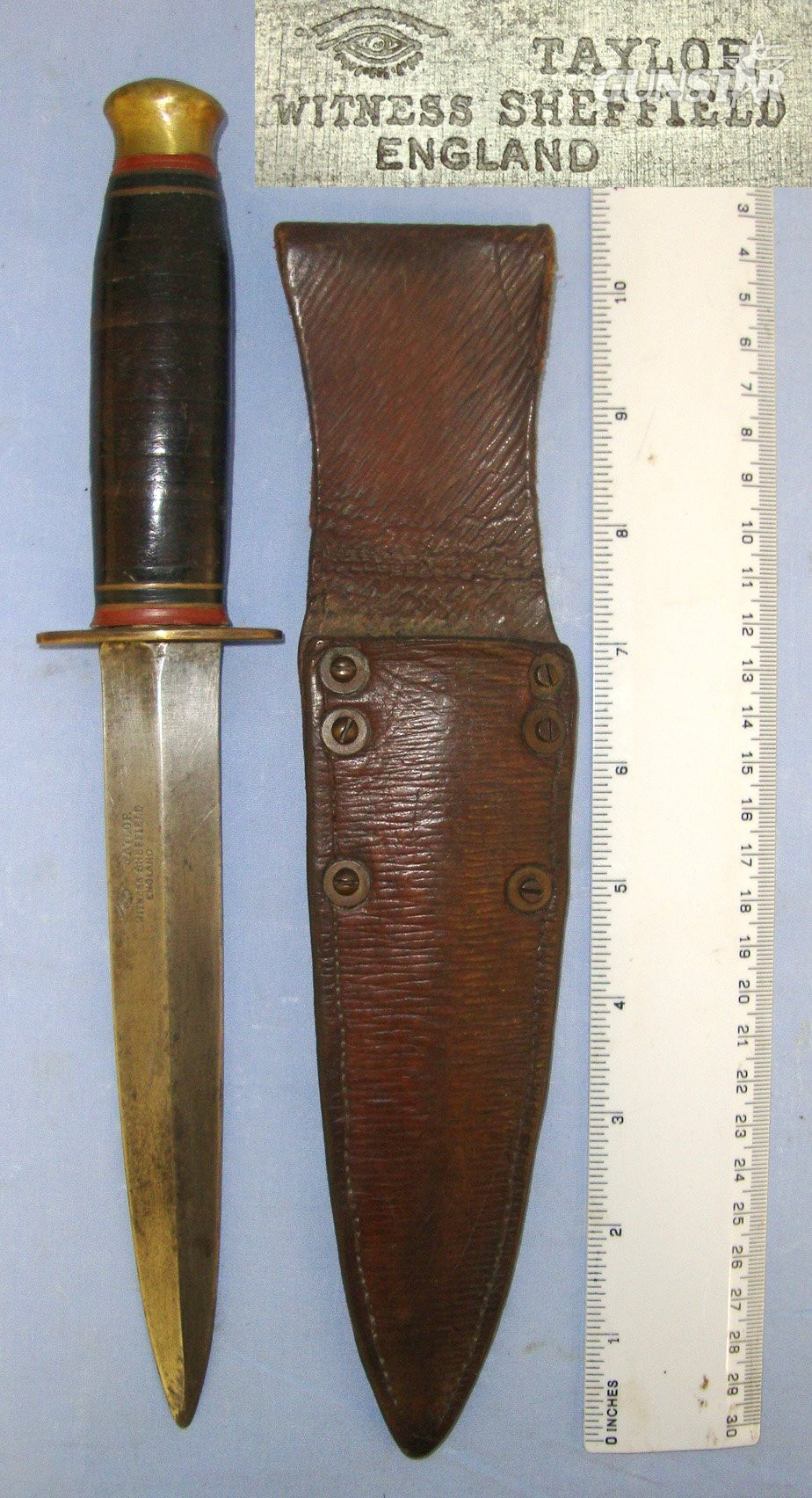 WW2 British Soldier’s Private Purchase Taylor Sheffield ‘Eye Witness’ Trademark F.S. Style Fighting Knife/Dagger & Scabbard Made From 1939 Pattern Leather. Sn 22998 Knive in 
