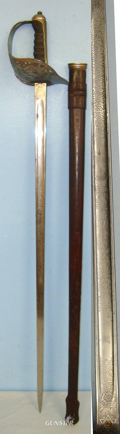 WW1 Era British WD 1897 Pattern Henry Wilkinson London Infantry Officer’s Sword With King George V Guard, Etched Blade Number 46608 & Leather Covered Field Service Scabbard. Sn 23633:5  Sword in 