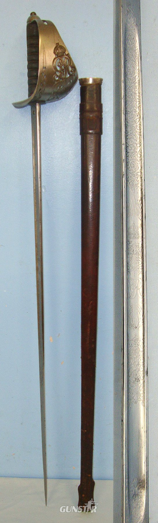  WW1 Era British WD 1897 Pattern Henry Wilkinson London Infantry Officer’s Sword With King George V Guard, Etched Blade Number 46608 & Leather Covered Field Service Scabbard. Sn 23633:5  Sword