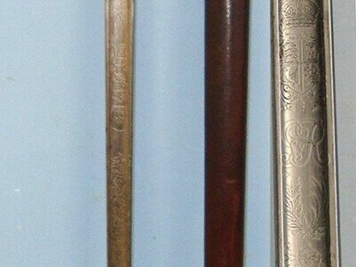 WW1 Era British WD 1897 Pattern Henry Wilkinson London Infantry Officer’s Sword With King George V Guard, Etched Blade Number 46608 & Leather Covered Field Service Scabbard. Sn 23633:5  Sword