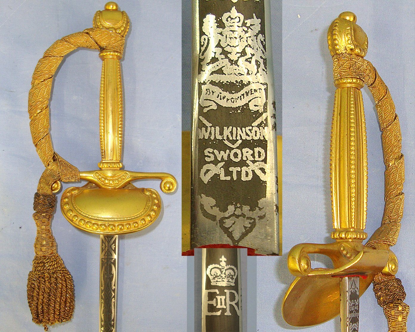 MINT**Post 1952 British Wilkinson Sword Ltd QE II Royal Household Clam Shell Court Sword With Blued & Etched Panels Blade, Gilt Hilt Fitted With Bullion Cord & Portepee & Scabbard. Sn 23573 Sword