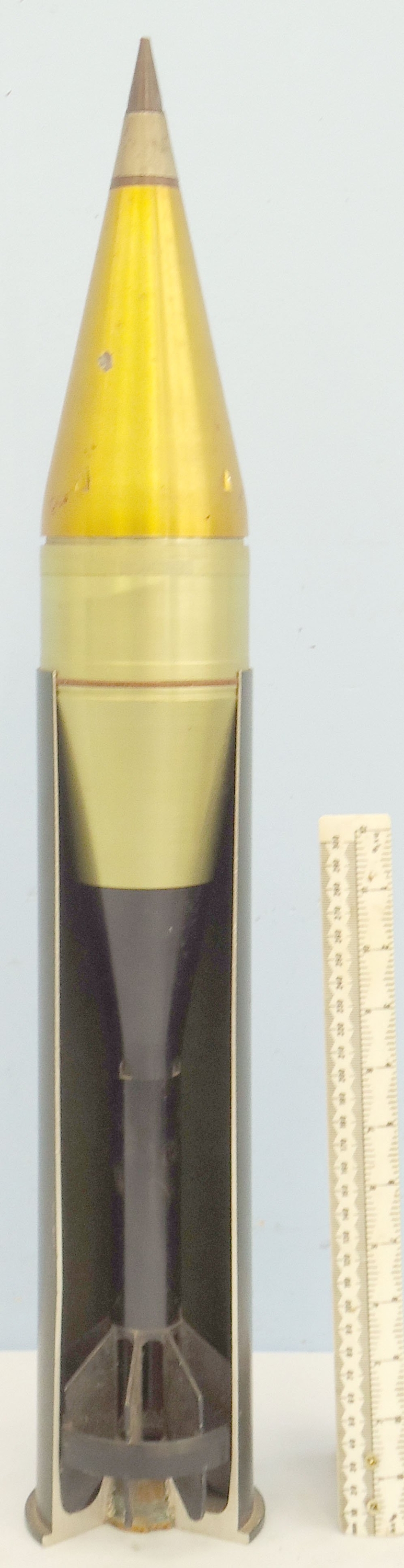 INERT DEACTIVATED. Rare, Mint, Early, 1970 Dated, Unfired, Cockerell 90mm gun (90x352) HEAT (High Explosive Anti-Tank) (Fin Stabilised, Hollow Charge) Round with a ¼ Sectioned Cartridge Case for Display or Instruction for the Cockerell Mk3-MA1 90mm gun.  INERT DEACTIVATED. Rare, Mint, Early, 1970 Dated, Unfired, Cockerell 90mm gun (90x352) HEAT (High Explosive Anti-Tank) (Fin Stabilised, Hollow Charge) Round with a ¼ Sectioned Cartridge Case for Display or Instruction for the Cockerell Mk3-MA1 90mm gun.   Other Ammunition 