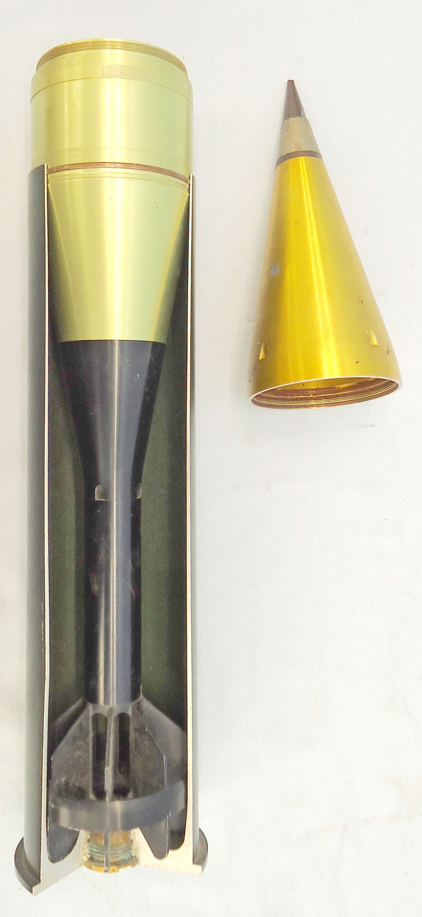 {CATEGORY} - INERT DEACTIVATED. Rare, Mint, Early, 1970 Dated, Unfired, Cockerell 90mm gun (90x352) HEAT (High Explosive Anti-Tank) (Fin Stabilised, Hollow Charge) Round with a ¼ Sectioned Cartridge Case for Display or Instruction for the Cockerell Mk3-MA1 90mm gun.  INERT DEACTIVATED. Rare, Mint, Early, 1970 Dated, Unfired, Cockerell 90mm gun (90x352) HEAT (High Explosive Anti-Tank) (Fin Stabilised, Hollow Charge) Round with a ¼ Sectioned Cartridge Case for Display or Instruction for the Cockerell Mk3-MA1 90mm gun.   Other Ammunition in 