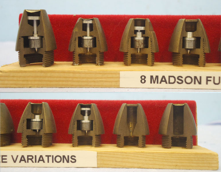 INERT DEACTIVATED. Set of 8 Variations Of ¼ Sectioned Noses Fuses For The 20 mm Madsen Anti Aircraft Gun. Sn - 20570 INERT DEACTIVATED. Set of 8 Variations Of ¼ Sectioned Noses Fuses For The 20 mm Madsen Anti Aircraft Gun. Sn - 20570  Other Ammunition