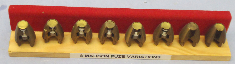  INERT DEACTIVATED. Set of 8 Variations Of ¼ Sectioned Noses Fuses For The 20 mm Madsen Anti Aircraft Gun. Sn - 20570 INERT DEACTIVATED. Set of 8 Variations Of ¼ Sectioned Noses Fuses For The 20 mm Madsen Anti Aircraft Gun. Sn - 20570  Other Ammunition