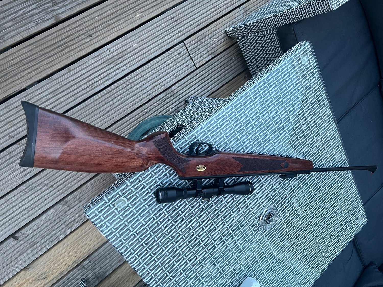 Norica Norica .22 break-barrel air rifle with hardwood stock and telescopic sight. Good overall condition with only minor cosmetic marks from normal use. Fitted with fiber-optic open sights and scope. Cocks and fires correctly. Ideal for target shooting and pest .22