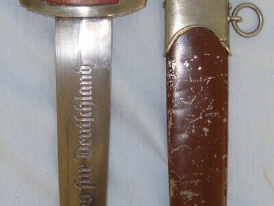 EARLY PRODUCTION**MAKER RARITY VALUE 9 (10 BEING THE RAREST)**Peter Lungstrass Solingen Nazi German 1933 Pattern SA With Motto Etched Blade & Scabbard. Sn 22152 Dagger