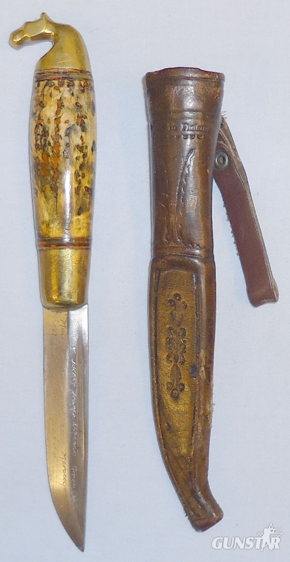Scandinavian ‘Puukko’ Knife and Leather Sheath. 21043. Knive in 