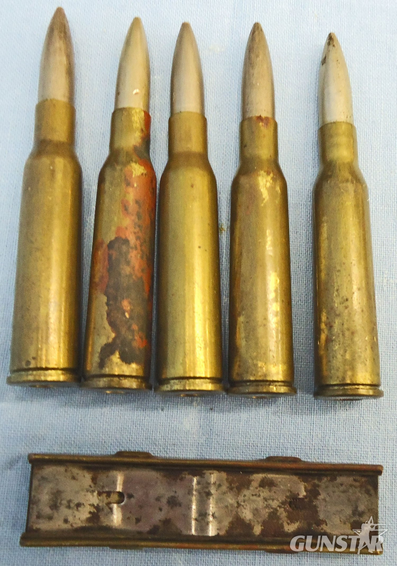INERT DEACTIVATED. WW2, Japanese 6.5mm (6.5x50SR) Arisaka 5 Ball Rounds in a Brass and Steel Stripper Clip. O 2311 INERT DEACTIVATED. WW2, Japanese 6.5mm (6.5x50SR) Arisaka 5 Ball Rounds in a Brass and Steel Stripper Clip. O 2311 Various Other Ammunition - {CATEGORY}