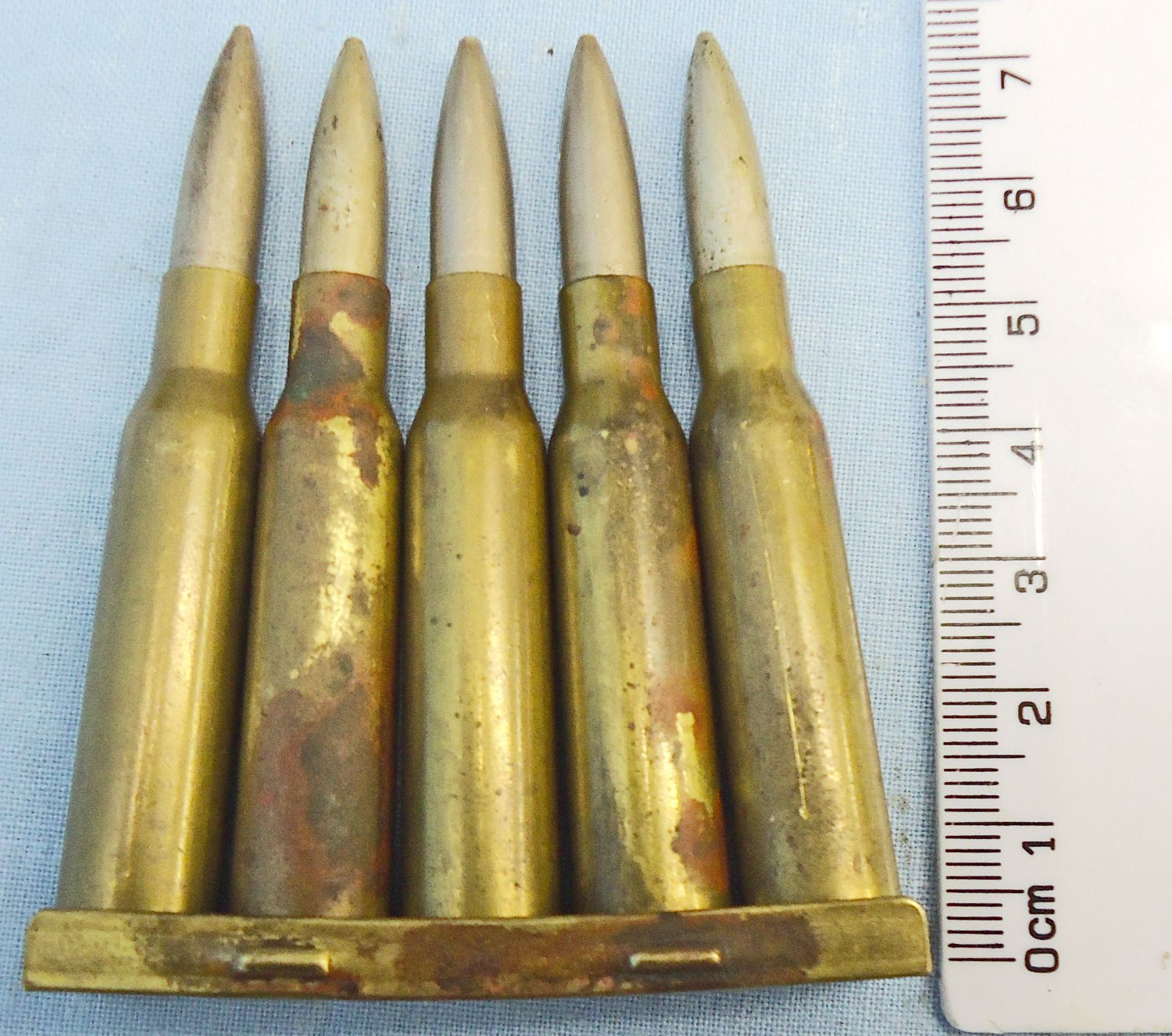 INERT DEACTIVATED. WW2, Japanese 6.5mm (6.5x50SR) Arisaka 5 Ball Rounds in a Brass and Steel Stripper Clip. O 2311 INERT DEACTIVATED. WW2, Japanese 6.5mm (6.5x50SR) Arisaka 5 Ball Rounds in a Brass and Steel Stripper Clip. O 2311 Various Other Ammunition - {CATEGORY} in 