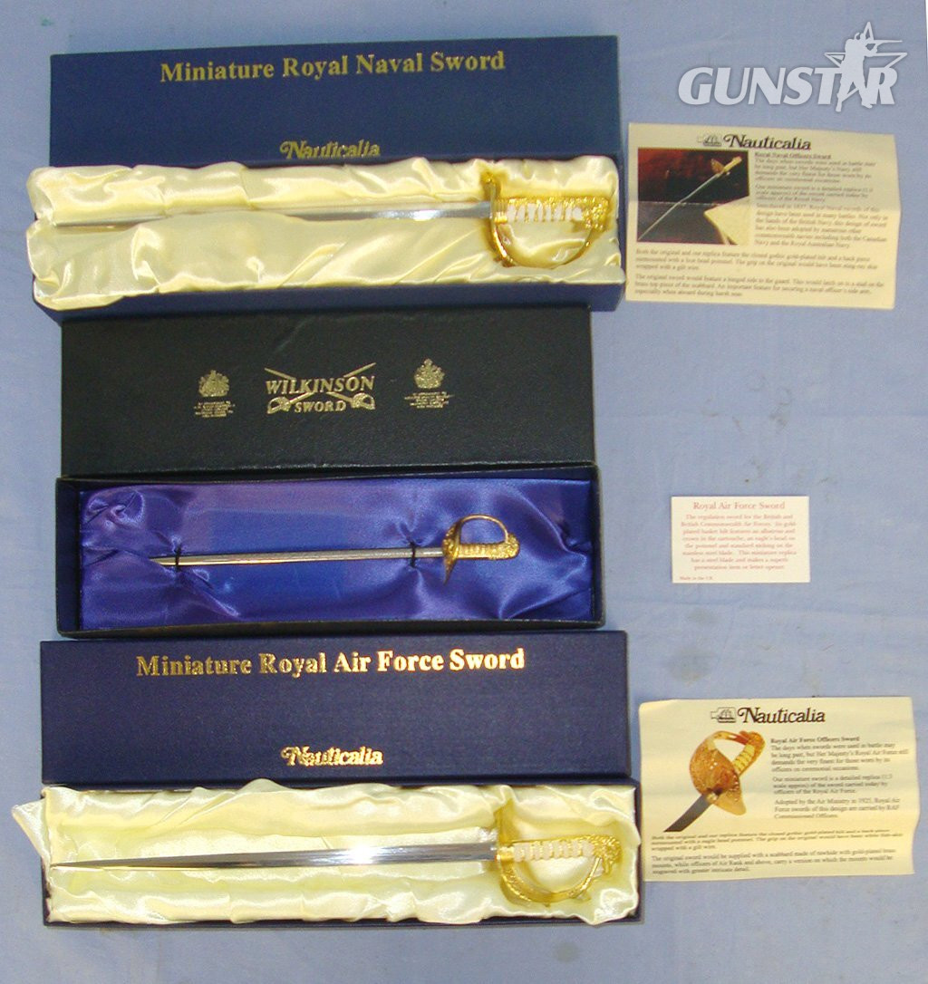 Collection Of 3 Boxed Mint Condition Miniature Swords: A British Royal Navy Officer’s By Nauticalia, A British Royal Air Force Officer’s Sword By Wilkinson & A British Royal Air Force Officer’s Sword By Nauticalia Each With Original Information Leaf Sword in 