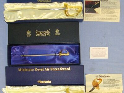 Collection Of 3 Boxed Mint Condition Miniature Swords: A British Royal Navy Officer’s By Nauticalia, A British Royal Air Force Officer’s Sword By Wilkinson & A British Royal Air Force Officer’s Sword By Nauticalia Each With Original Information Leaf Sword