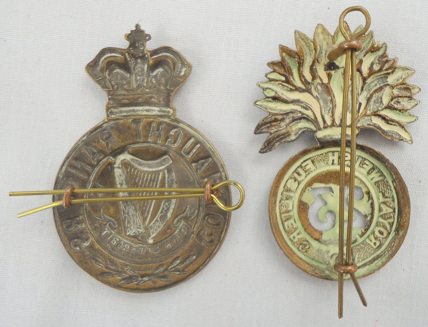  Pair* Royal Welsh Fusiliers 23rd Regiment and Connaught Rangers Glengarry Cap Badges. 22434:15. Pair* Royal Welsh Fusiliers 23rd Regiment and Connaught Rangers Glengarry Cap Badges. 22434:15.  Antique & Militaria