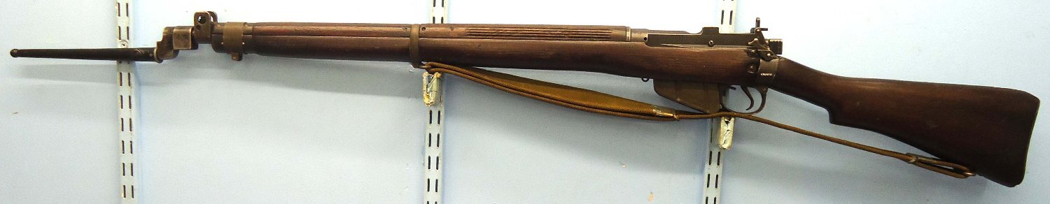 WW2, 1943 Dated, British Army Long Branch Canada No.4 MK 1* .303 Calibre Rifle, Webbing Sling, WW2 Pig Sticker Bayonet & Scabbard. Sn 23800 WW2, 1943 Dated, British Army Long Branch Canada No.4 MK 1* .303 Calibre Rifle, Webbing Sling, WW2 Pig Sticker Bayonet & Scabbard. Sn 23800 Bolt Action Various Rifle - {CATEGORY}