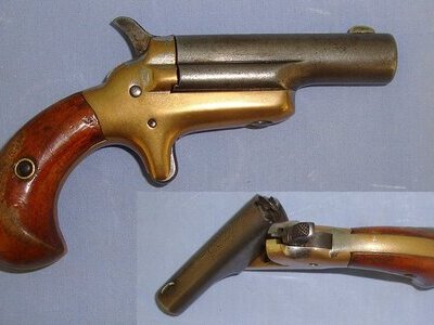 Colt With Pivot Barrel & Traces Of Original Factory Nickel Plate Finish. Sn 23166 .41 Short Rimfire Deringer