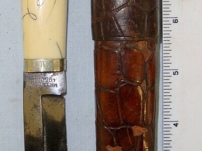 UNUSUAL**Late Victorian Era ‘Ladies’ Hill & Son London Bowie Knife With Antique Marine Ivory Hilt Scrimshaw Signed ‘Vera’, German Silver Ferrule Engraved ‘From Ronnie’ & Original Open Top Crocodile Skin Scabbard With ‘Hill & Son Haymarket’ Knive