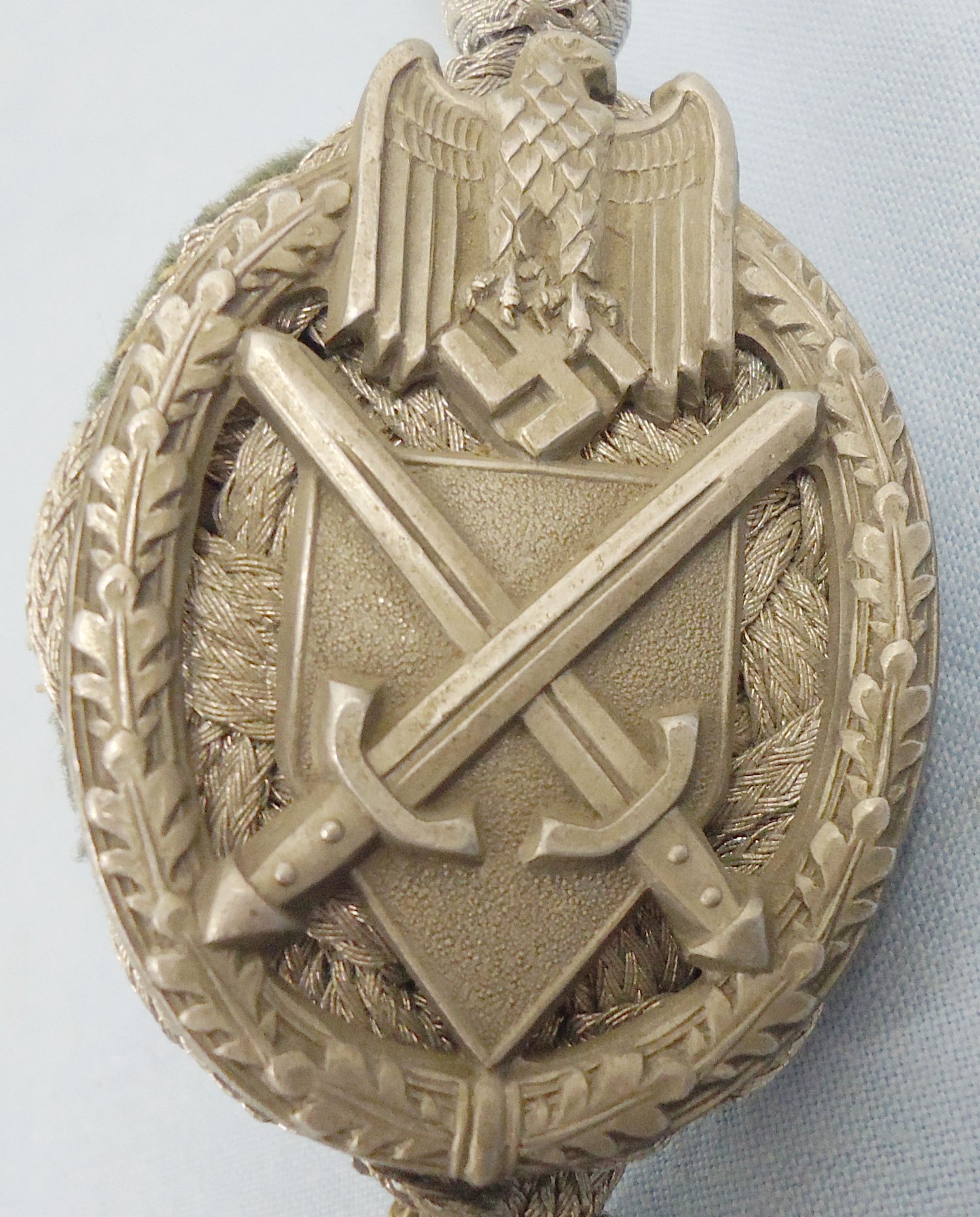 WWII Era German Armed Forces Class 2 (Silver) ‘Schützenschnur‘ Badge of Marksmanship. M 141. WWII Era German Armed Forces Class 2 (Silver) ‘Schützenschnur‘ Badge of Marksmanship. M 141.  Antique & Militaria