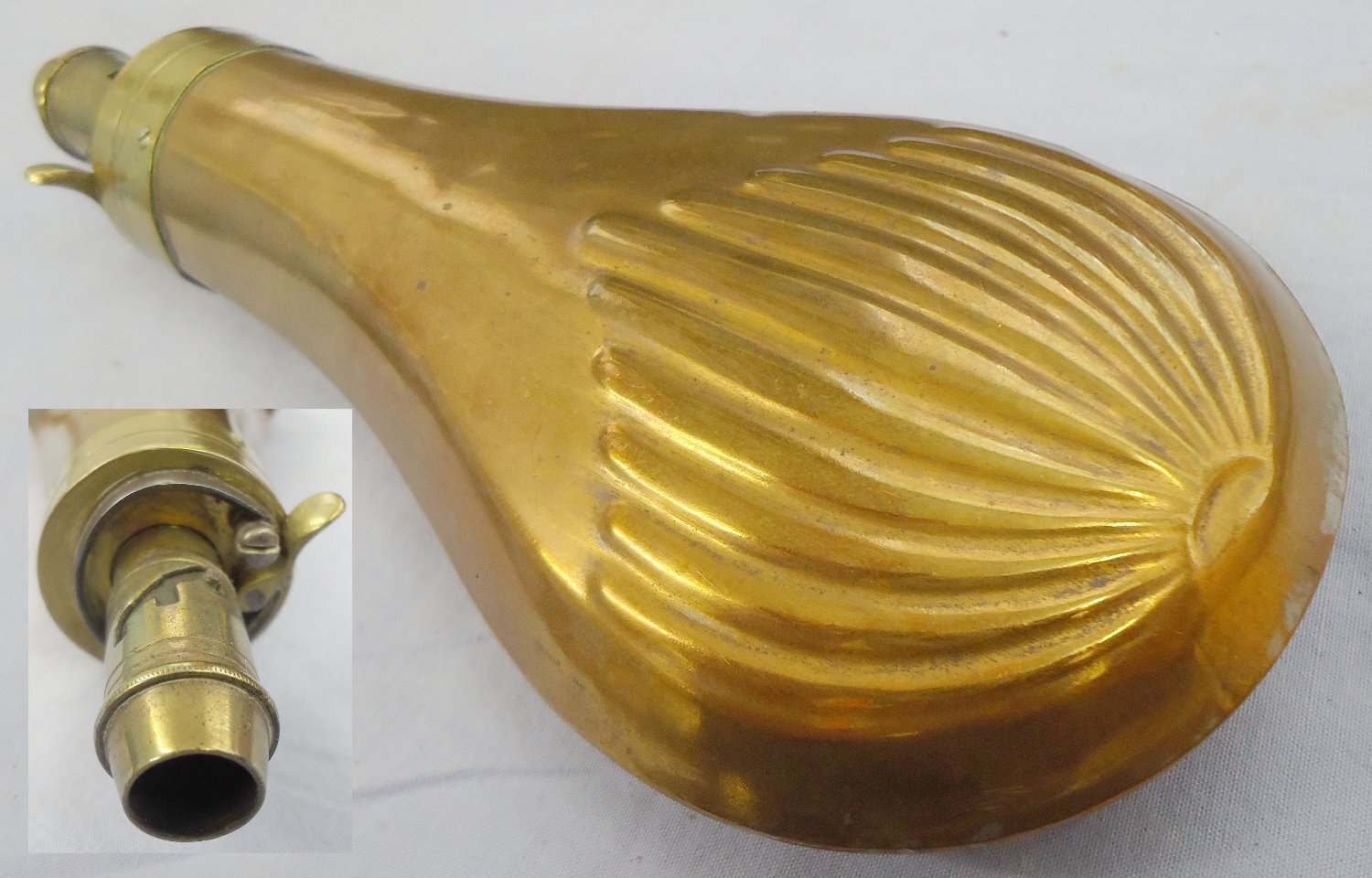 c1800’s Gun Size Embossed Fluted Design Copper Black Powder Flask with Graduated, Sprung Brass Nozzle Charger. 22441:34. c1800’s Gun Size Embossed Fluted Design Copper Black Powder Flask with Graduated, Sprung Brass Nozzle Charger. 22441:34. Other Accessory