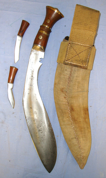 WW2 1944 British Army In India WD Gurkha Kukri, 2 Skinners & Leather Covered Wood Scabbard With Khaki Canvas Field Combat Cover & Leather Laced Webbing Frog Other Blade