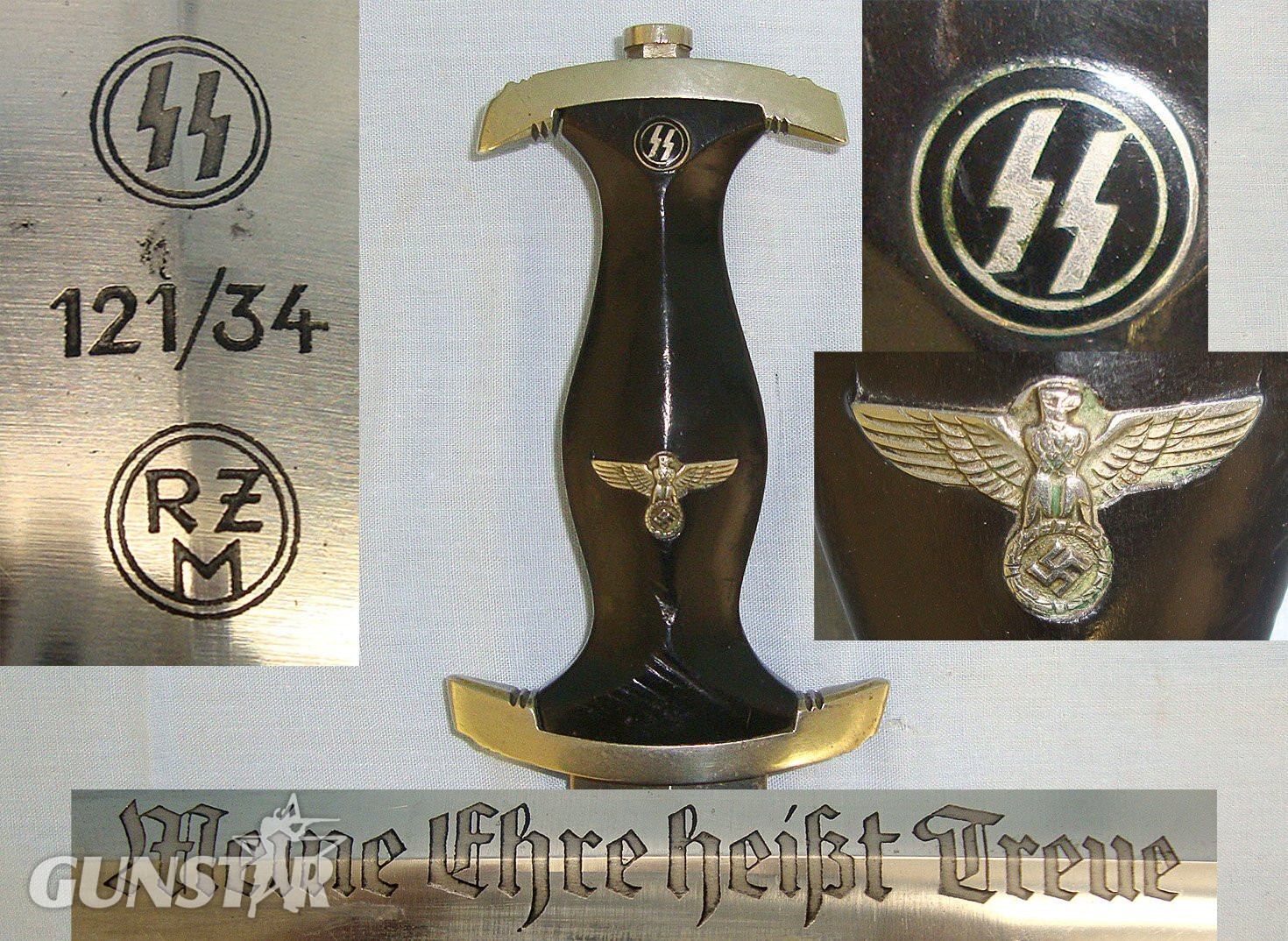 RARE**ORIGINAL**1934 Dated WW2 Era Nazi German RZM 121/34 1933 Pattern SS Man’s Dagger With SS Runes, Motto Etched Blade & Scabbard. Sn 23247  Dagger