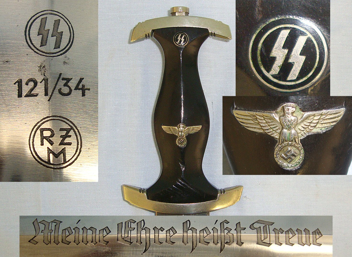 RARE**ORIGINAL**1934 Dated WW2 Era Nazi German RZM 121/34 1933 Pattern SS Man’s Dagger With SS Runes, Motto Etched Blade & Scabbard. Sn 23247  Dagger