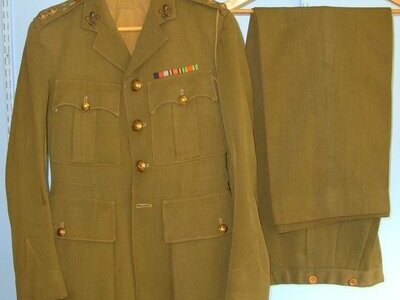 WW2 Manchester Regiment Officer’s Uniform Khaki Service Jacket With WW2 Campaign Medal Ribbons, Lieutenant Insignia, Lanyard & Trousers By Moss Bros London. Sn 11531. WW2 Manchester Regiment Officer’s Uniform Khaki Service Jacket With WW2 Campaign Medal Ribbons, Lieutenant Insignia, Lanyard & Trousers By Moss Bros London. Sn 11531. Clothing