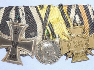 WWII Medal Group WWI Iron Cross 2nd Class on a Combatant Ribbon Military Merit Order (Württemberg) and a 1914 – 1918 Cross of Honour with Swords). N 125. WWII Medal Group WWI Iron Cross 2nd Class on a Combatant Ribbon Military Merit Order (Württemberg) and a 1914 – 1918 Cross of Honour with Swords). N 125.  Antique & Militaria