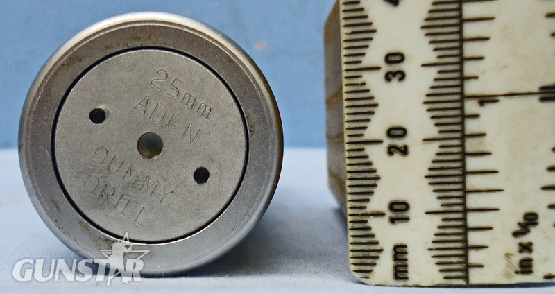 INERT. Mint British 25mm Aden Mark 5 (25x137) Dummy Drill Round In Cardboard Transit Sleeve. - O 1677 INERT. Mint British 25mm Aden Mark 5 (25x137) Dummy Drill Round In Cardboard Transit Sleeve. - O 1677  Other Ammunition