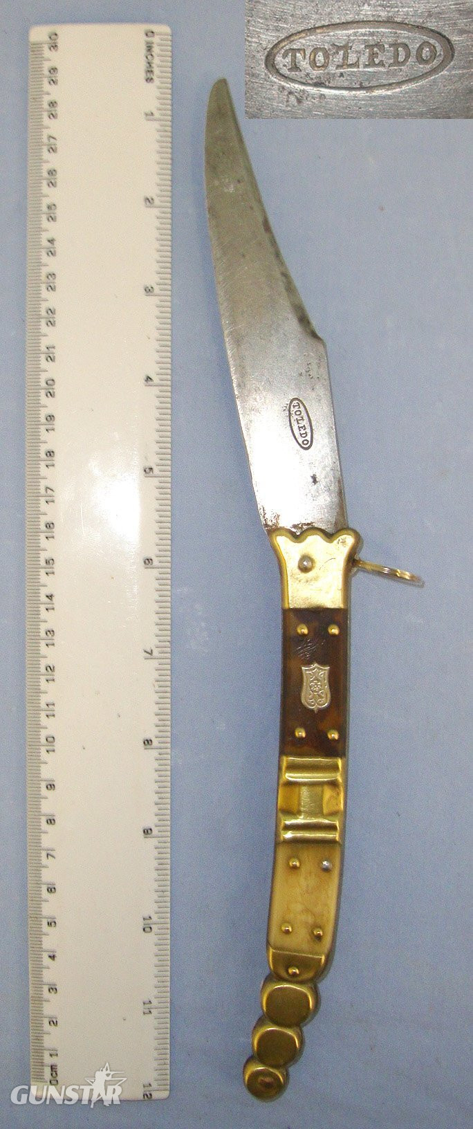 QUALITY**19th Century Spanish Toledo Steel Navaja Folding Fighting / Utility Knife With Sharp Scimitar Form Blade Marked ‘Toledo’, Hand Decorated Polished Horn & Brass Section Scales. Sn 21966:3 Knive in 