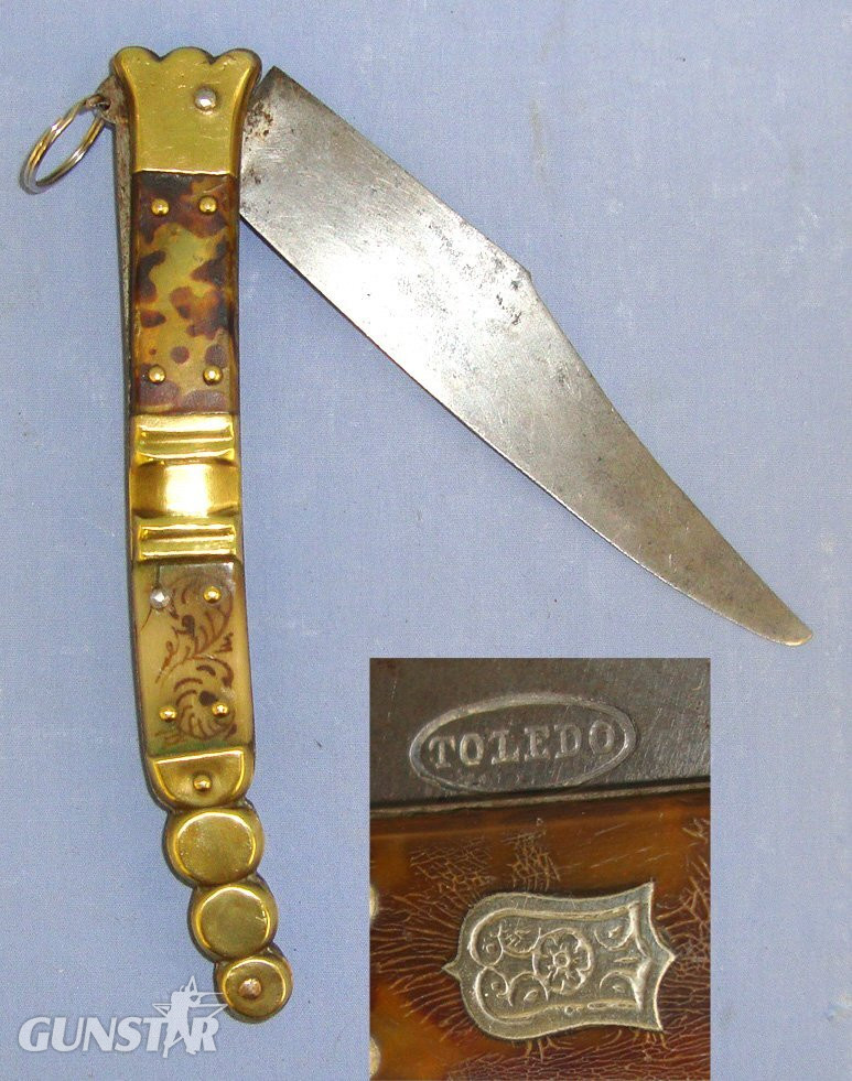 QUALITY**19th Century Spanish Toledo Steel Navaja Folding Fighting / Utility Knife With Sharp Scimitar Form Blade Marked ‘Toledo’, Hand Decorated Polished Horn & Brass Section Scales. Sn 21966:3 Knive