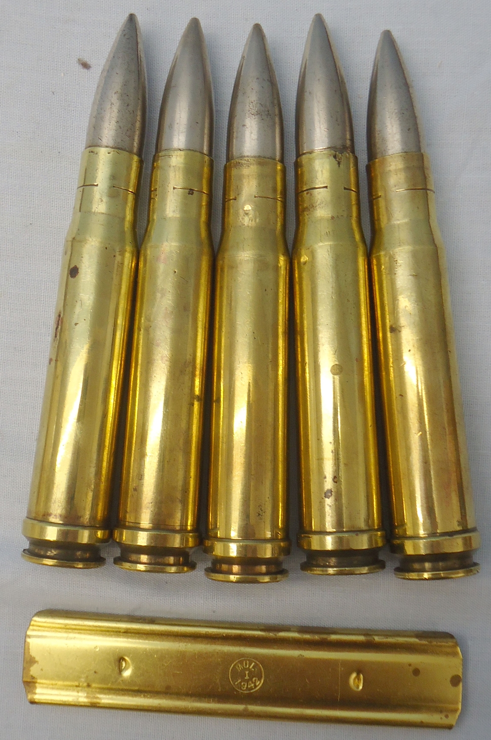  DEACTIVATED INERT .55 Boys (14x99B) Mark 2 Armour Piercing Anti-Tank Rifle, 5 Rounds In Stripper Clip. - O 1974 DEACTIVATED INERT .55 Boys (14x99B) Mark 2 Armour Piercing Anti-Tank Rifle, 5 Rounds In Stripper Clip. - O 1974  Other Ammunition