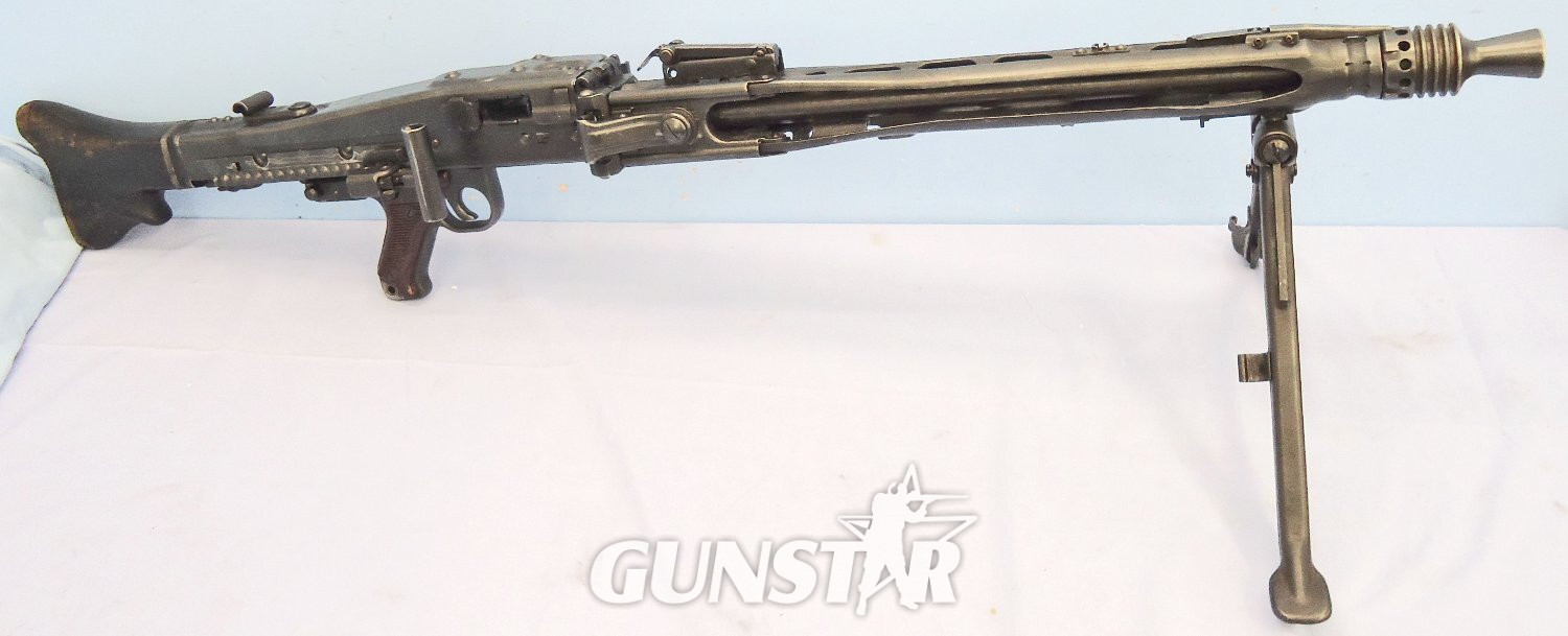 WW2, 1943 Dated, Nazi German, Matching Numbers, Maschinengewehr MG 42, 7.92mm Machine Gun by cra (MAGET - Maschinenbau und Geraetebau GmbH 1942-43) *1997 DEACTIVATION*. Sn 23310:3 WW2, 1943 Dated, Nazi German, Matching Numbers, Maschinengewehr MG 42, 7.92mm Machine Gun by cra (MAGET - Maschinenbau und Geraetebau GmbH 1942-43) *1997 DEACTIVATION*. Sn 23310:3 Various  Machine Gun - {CATEGORY} in 