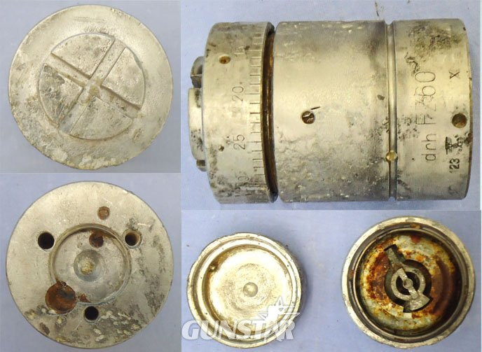 INERT DEACTIVATED, WW2, German FZ60 Clockwork Bomb Fuze for Air Dropped Containers and Bakelite Transit Container. - O 2149 INERT DEACTIVATED, WW2, German FZ60 Clockwork Bomb Fuze for Air Dropped Containers and Bakelite Transit Container. - O 2149  Other Ammunition
