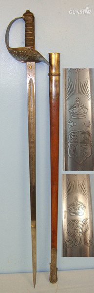 George V British Robert Mole & Sons Birmingham Makers To The War & India Offices 1897 Pattern Infantry Officer’s Sword To ‘A.A. Harrison 4th Battalion Manchester Regiment’ With Etched Blade Number 6581 & Leather Field Covered Scabbard Sword in 