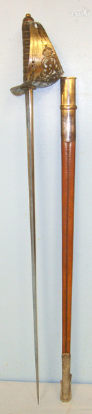  George V British Robert Mole & Sons Birmingham Makers To The War & India Offices 1897 Pattern Infantry Officer’s Sword To ‘A.A. Harrison 4th Battalion Manchester Regiment’ With Etched Blade Number 6581 & Leather Field Covered Scabbard Sword