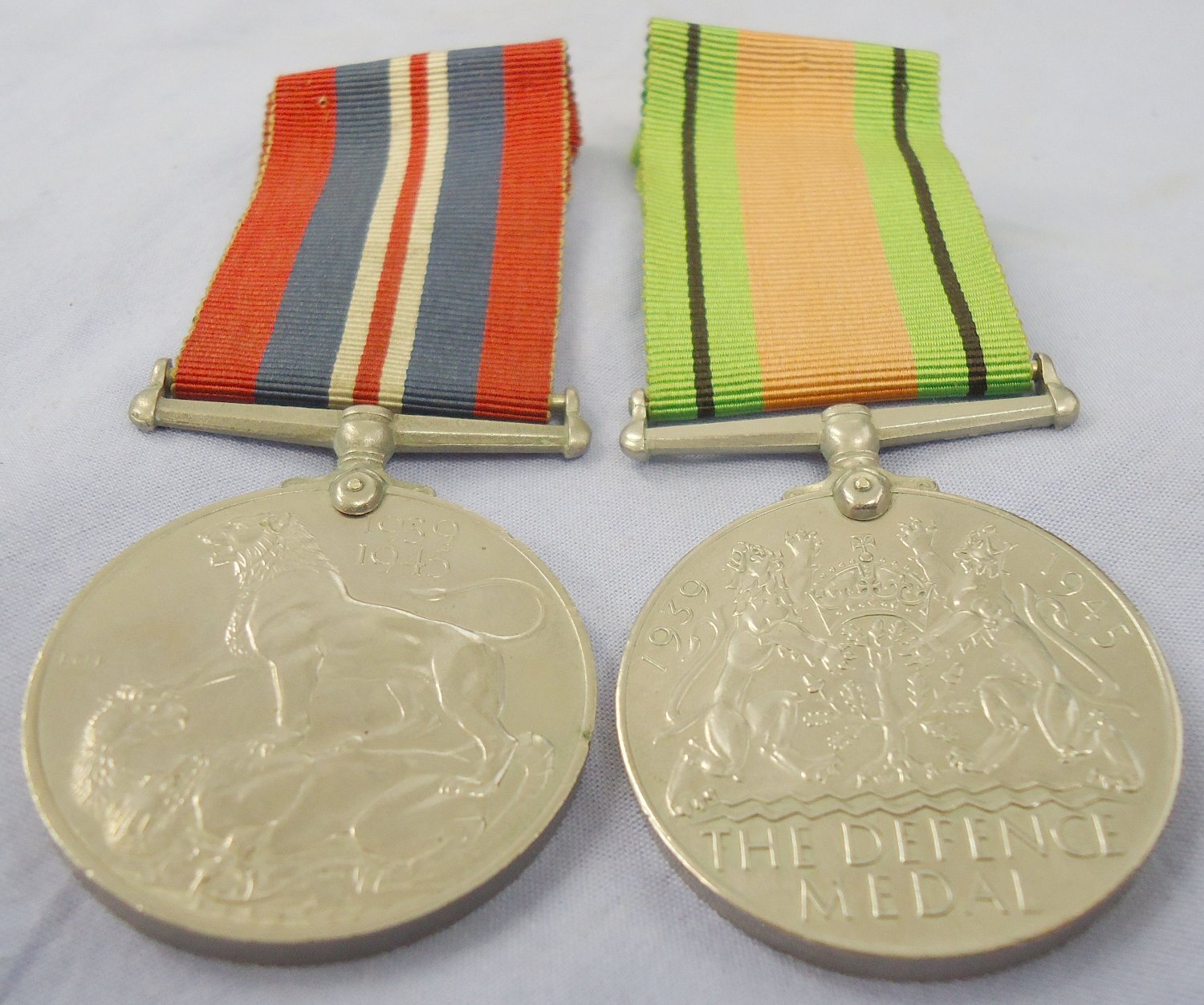 Pair* British WWII Defence Medal & War Medal. N 120. Pair* British WWII Defence Medal & War Medal. N 120. Antique & Militaria