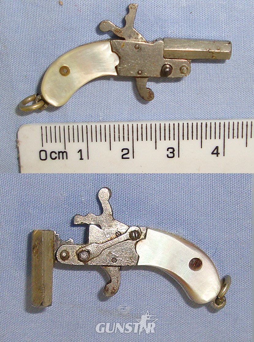 MINIATURE**EXPERTLY CRAFTED**Austrian Late 19th Century Break Action Pin Fire Metal Pistol With Mother Of Pearl Grips. Sn 23563:2  miniature pistol Obsolete Single Shot