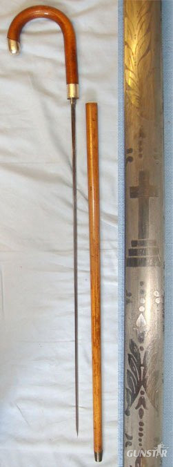 Inter War 1932 British Gentleman’s Mallaca Sword Stick With Sterling Silver Hall Marked Mounts Presented To D. Aspinall 12th May 1932 By His Fellow Workers With Blued & Etched Panels Blade. Sn 14448 Sword in 