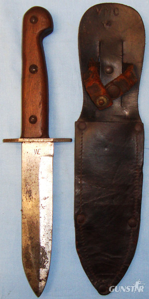 WWII Australian Wooden Gripped Combat Knife and Leather sheath. ED 2619. Knive in 