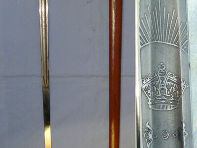 NAMED**British WW1 August 1915 Dated George V 1897 Pattern British Infantry Officer\'s Sword By Deakin & Sons Sheffield With Etched Blade to ‘A.H. Hunnings’ & Leather Field Combat Covered Wood Scabbard With Sam Browne Pattern Leather Sword Frog Sn 223 Sword