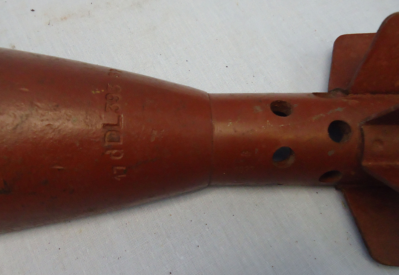  INERT DEACTIVATED. German WW2, 8 cm Granatwerfer 34 High Explosive Half Sectioned Mortar. - O 1637 INERT DEACTIVATED. This is a German WW2, 8 cm Granatwerfer 34 high explosive half sectioned mortar round. The round has been sectioned in half for display and instruction. The round consists of a cast iron body with 3 pairs of presses steel fins spot weld  Other Ammunition