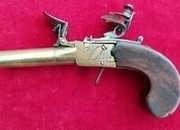 Ref 2211. A scarce English Flintlock box-lock muff pistol engraved Twigg with Br frame. C. 1800.   Muzzleloader